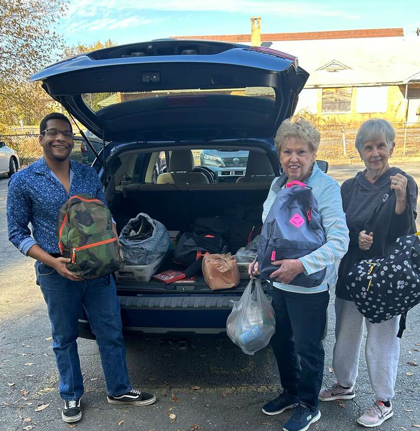 Willing Workers of WH give backpacks
