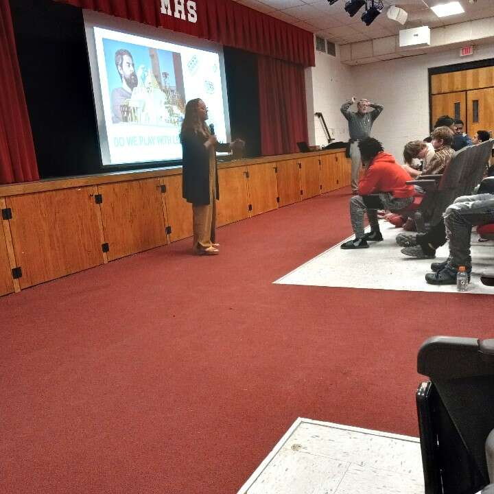 Harding instructs kids on building
