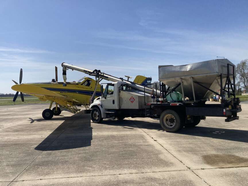 Crop dusters zooming around at work in area