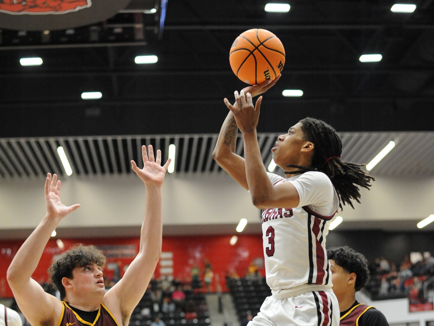 5A STATE BASKETBALL: 3-pointer sends Pine Bluff to 2OT, leads to semifinal win