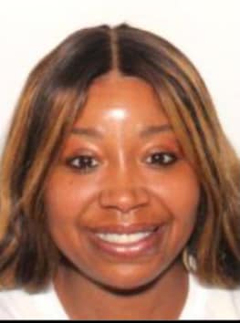 Woman arrested in 2 PB robberies