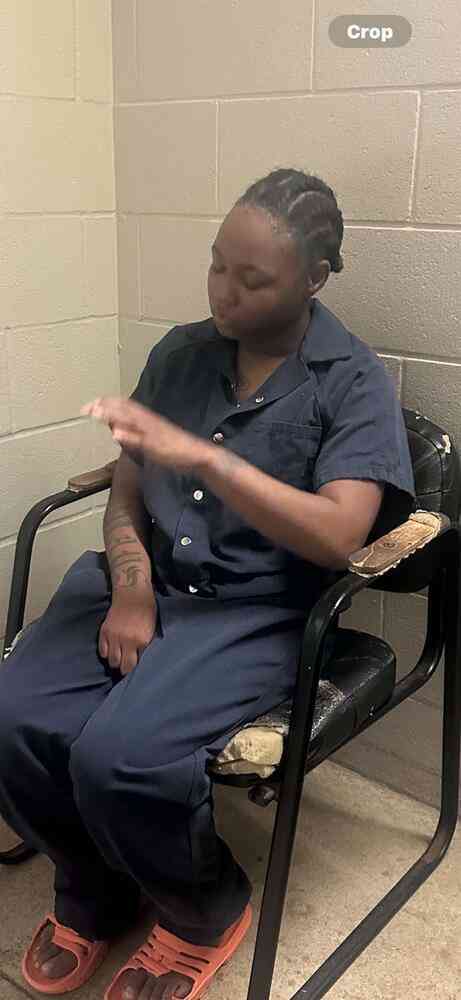 Detention center worker arrested