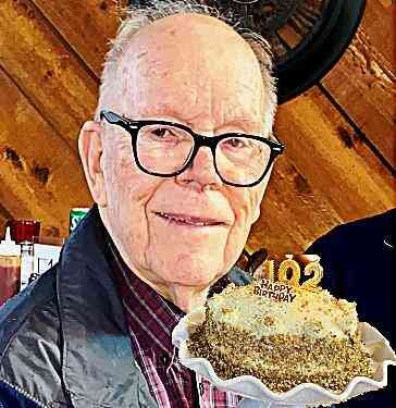 Businessman Ken Theis marks 102nd birthday