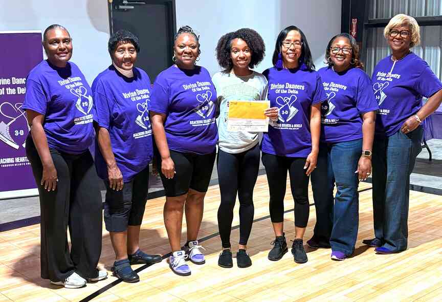 Divine Dancers present student $500 scholarship