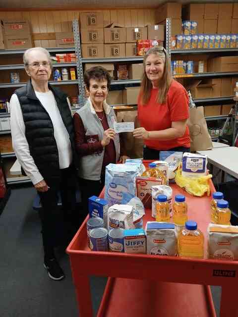 Club gives to White Hall Food Pantry