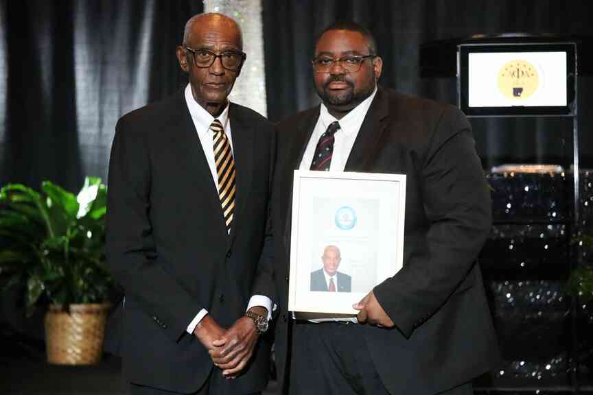 Alpha Phi Alpha Fraternity presents 33 students with $1,000 scholarships