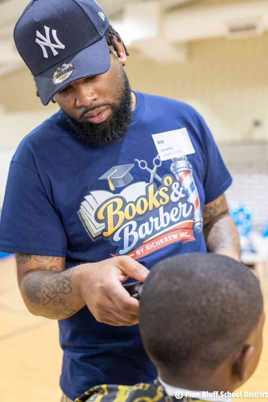 Free haircuts, books project at PBSD’s Broadmoor Elementary marks year 5